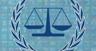 image of justice scales with international flags. how to convert an international contract into UK law equivalent