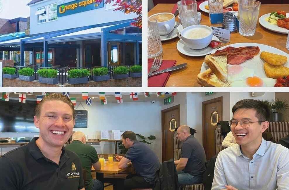 Attendees enjoying a networking breakfast at Orange Square Bar in Sussex, with a full English breakfast, coffee and name cards on the table.