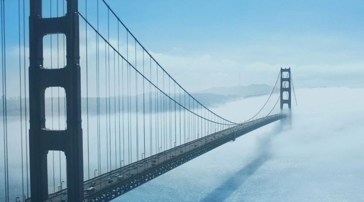 A practical guide to bridging loans for UK businesses and investors, covering regulated vs unregulated lending, security, guarantees, exit strategy and risk management.