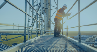 Environmental consultant assessing contaminated land risk at a commercial property site