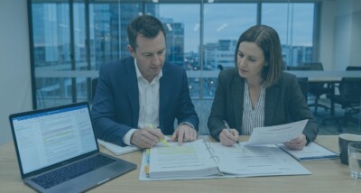 Business advisers reviewing warranty and misrepresentation issues in a contract Warranty vs misrepresentation claim after a business deal Commercial contract review for warranty and misrepresentation risk
