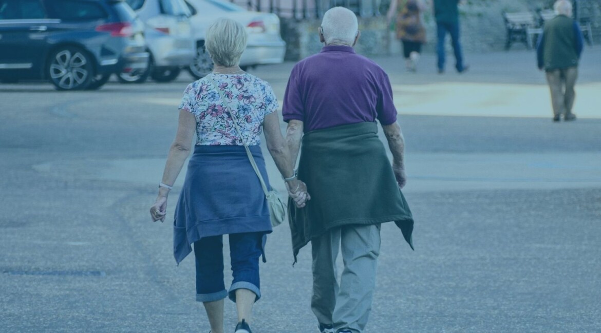 Couple reviewing spouse visa and family immigration documents Family preparing UK spouse, fiancé or dependant visa application UK family visa application documents being checked before submission