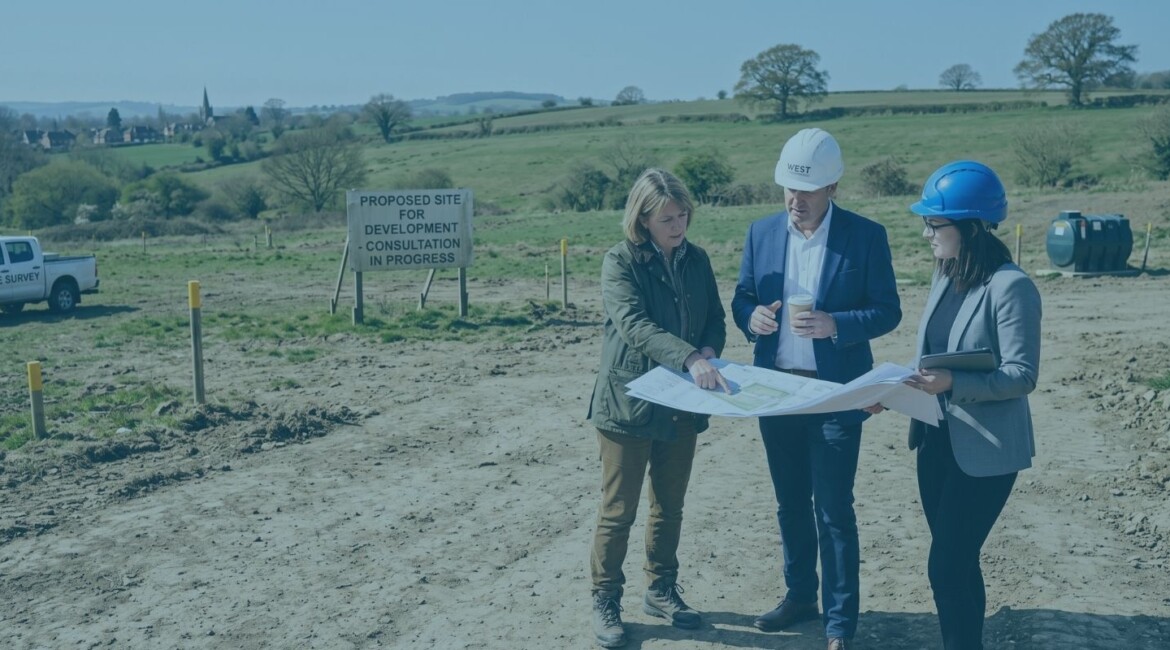 Landowner and developer reviewing plans for development land subject to an overage agreement