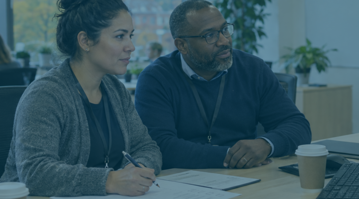 HR manager and IT colleague reviewing email records and a checklist to prepare responses to subject access requests.