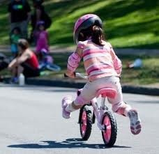 child on bike